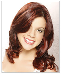Model with mid-length red highlighted hair