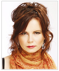 Model with curly mid-length hairstyle