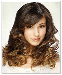 Model with long curly two-tone hair
