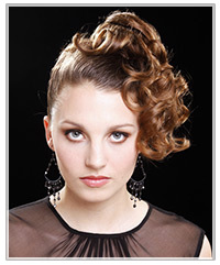 Model with long curly upstyle