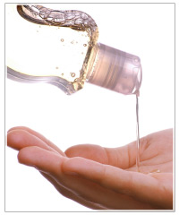 Hair shampoo being poured into hand.