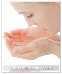 Model washing her face and hands