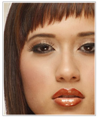 Model with brown hair and brown eye shadow