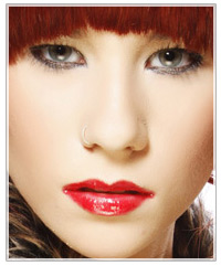 Model with red hair and red lips