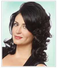 Model with dark, volume filled hair