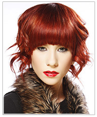 Model with red hair and blunt bangs