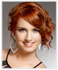 Model with wavy bangs and an upstyle