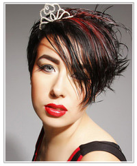 Model with short black hair and red highlights