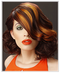 Model with red hair and orange highlights