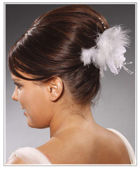 Model with a feather hair clip