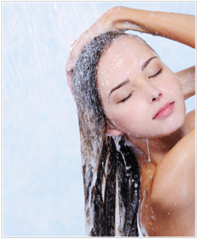 Model shampooing her hair