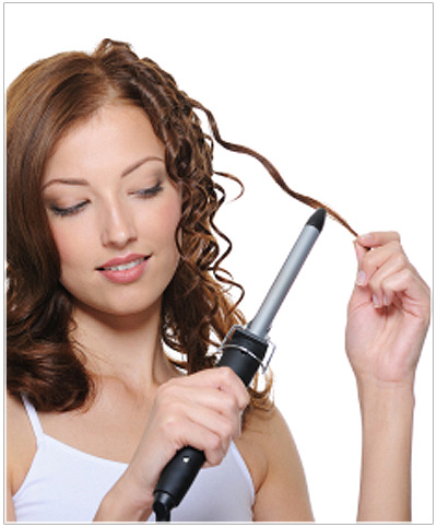 Model using a curling iron